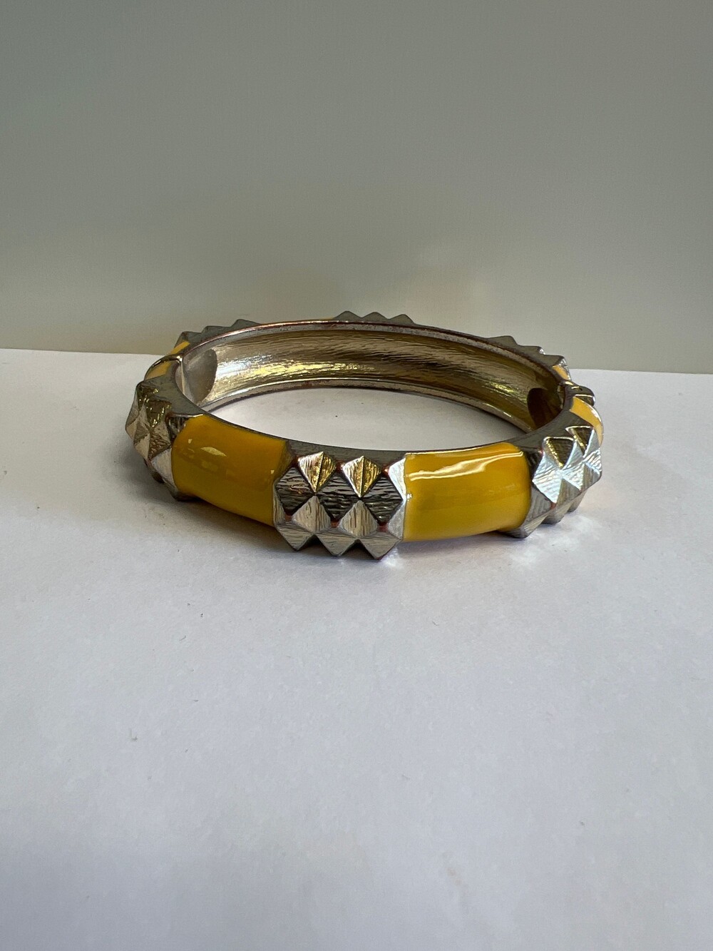 Yellow Enamel Silver Tone Bangle Bracelet with Pyramid Studs